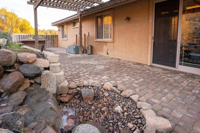 view of patio featuring a pergola