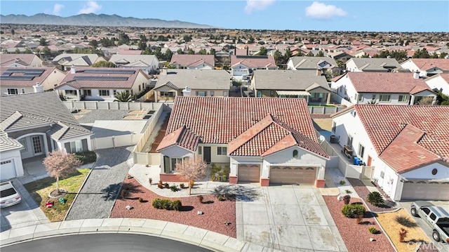 drone / aerial view featuring a mountain view