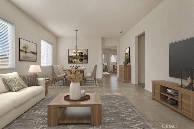 living room with a notable chandelier