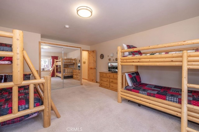 bedroom featuring a closet and carpet floors