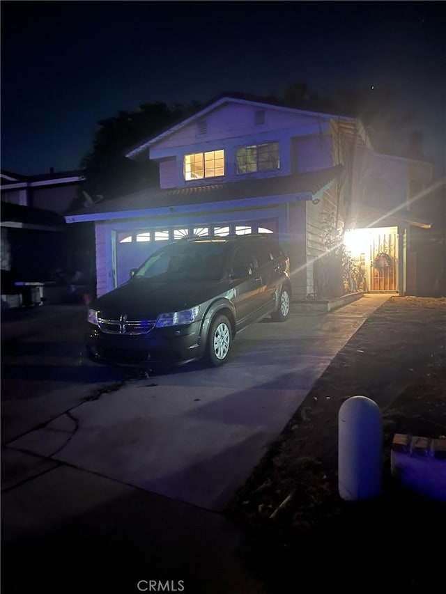 view of front of property with a garage