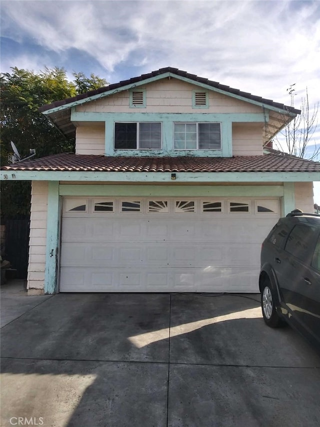 exterior space featuring a garage