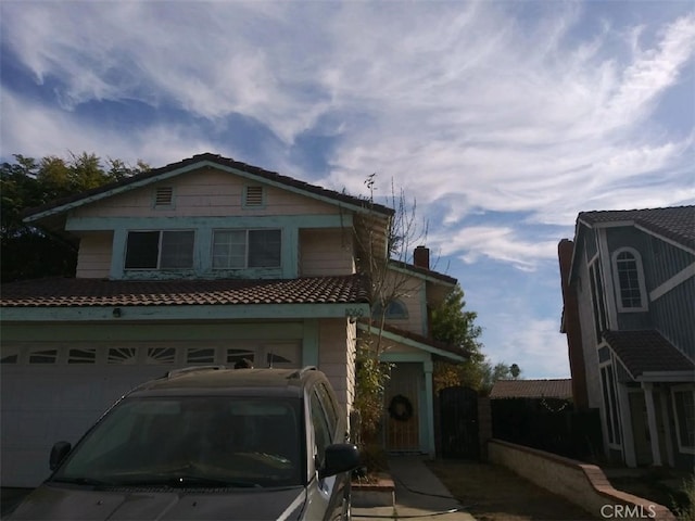 front of property featuring a garage