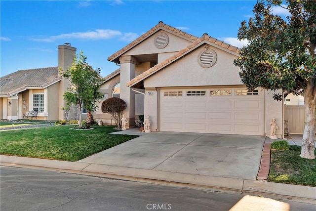 front facade with a garage and a front lawn