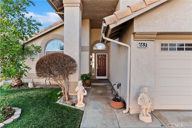 property entrance featuring a garage