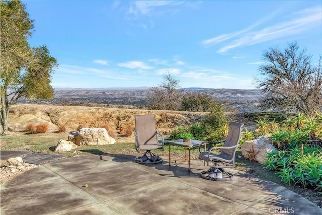 view of patio featuring a mountain view