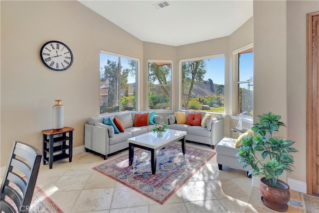 sunroom / solarium with vaulted ceiling