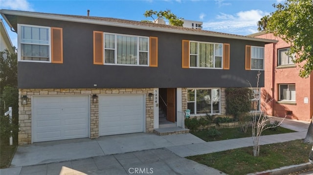 view of property featuring a garage