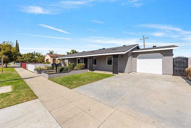 single story home with stucco siding, driveway, a gate, fence, and a garage