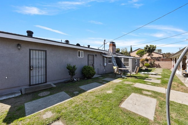 view of yard with a patio and fence