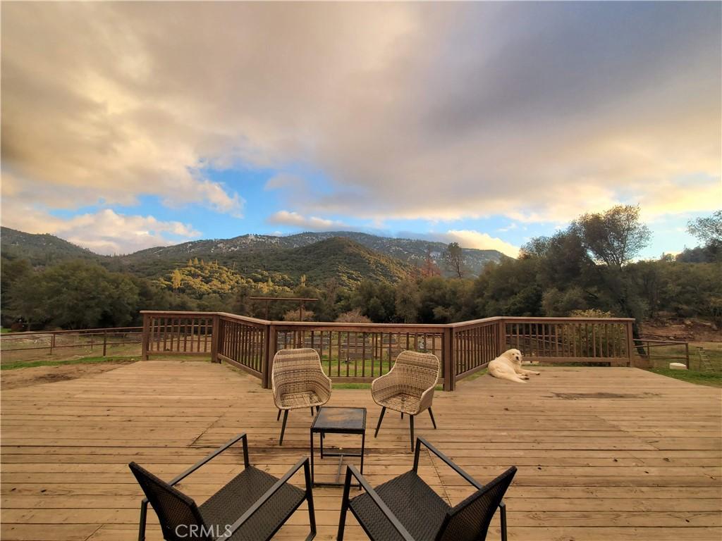 deck at dusk with a mountain view