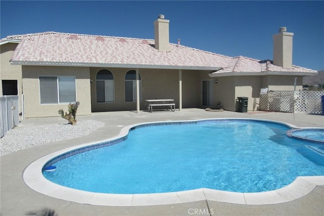 view of swimming pool featuring a patio