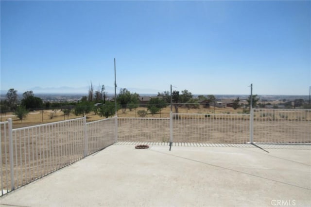 view of patio / terrace featuring a rural view