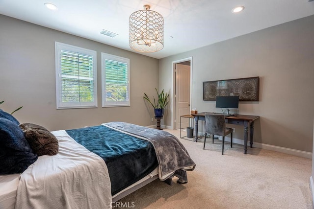 bedroom with light colored carpet