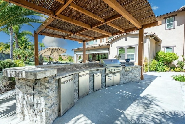 view of patio / terrace with area for grilling and a grill