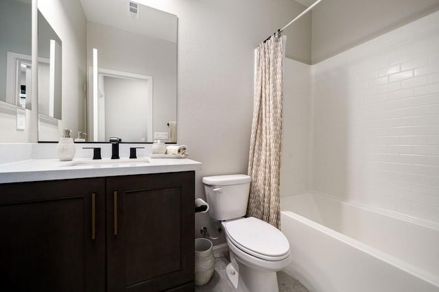 full bathroom featuring vanity, toilet, and shower / tub combo with curtain