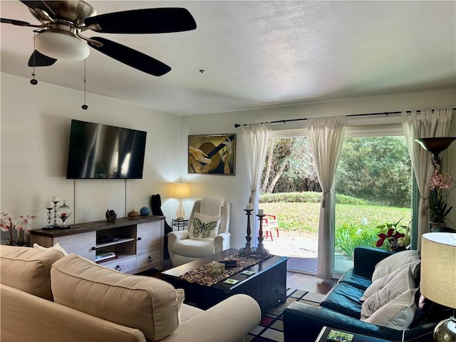 living area featuring a ceiling fan and light wood-type flooring