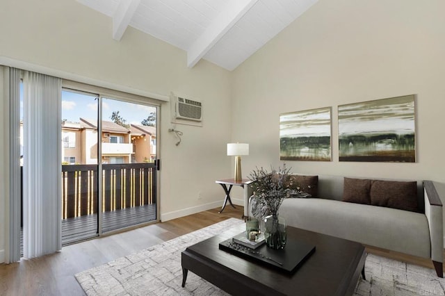 living room featuring vaulted ceiling with beams, light hardwood / wood-style floors, and wood ceiling