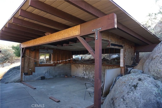 view of patio / terrace with an outbuilding