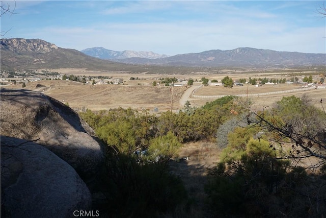 view of mountain feature with a rural view