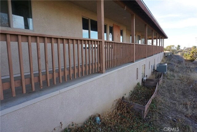 view of side of home with cooling unit