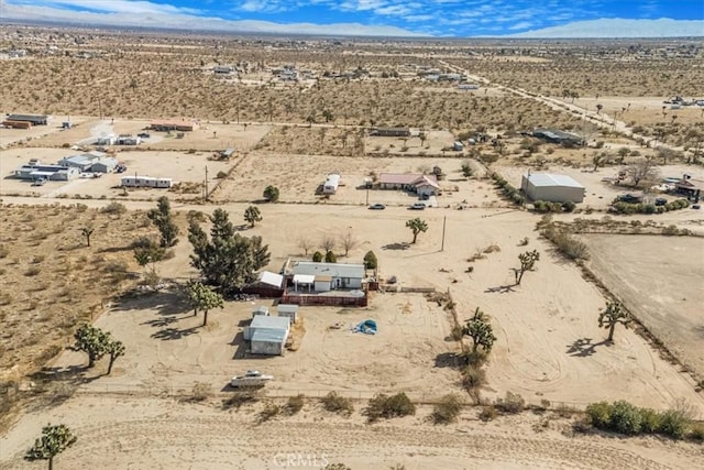 drone / aerial view featuring view of desert