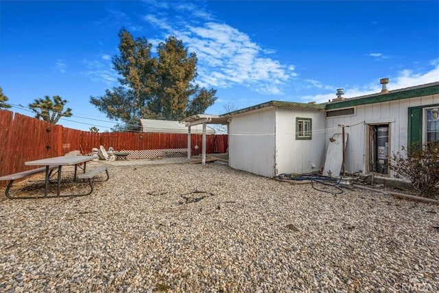 view of yard with a fenced backyard and a patio