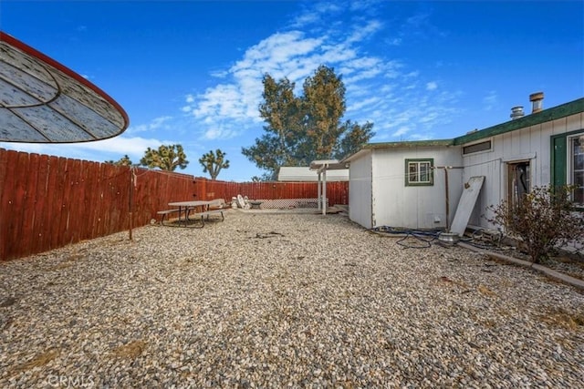 view of yard featuring a patio and a fenced backyard