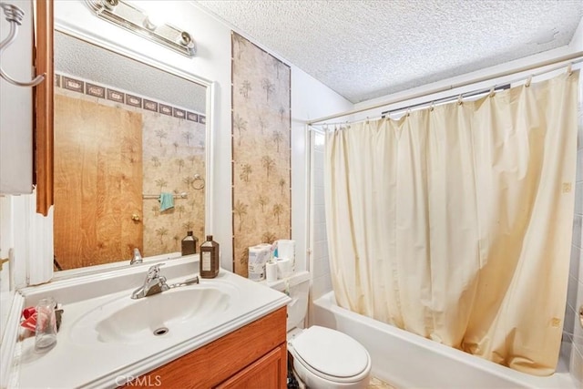 bathroom with shower / bath combo, toilet, a textured ceiling, and vanity