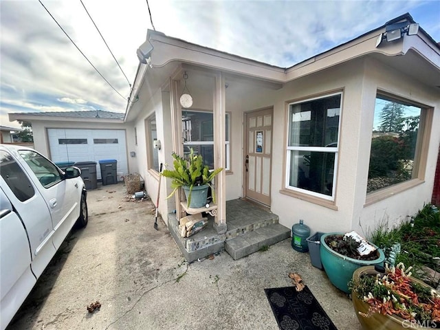 view of side of home with a garage