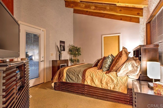 bedroom featuring beam ceiling, high vaulted ceiling, and light colored carpet