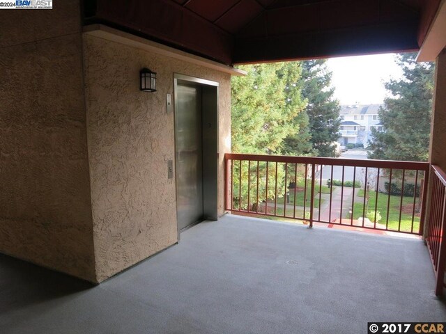 view of patio featuring elevator