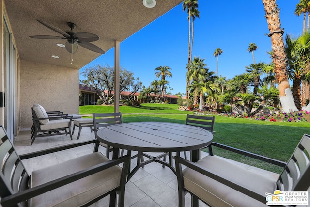 view of patio with ceiling fan