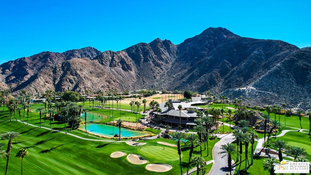 view of home's community featuring a water and mountain view