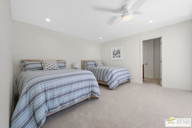 carpeted bedroom featuring ceiling fan