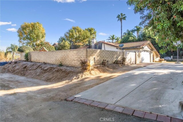 exterior space featuring a garage