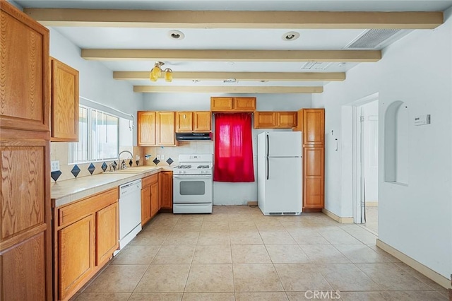 kitchen featuring light tile patterned flooring, white appliances, backsplash, sink, and beam ceiling