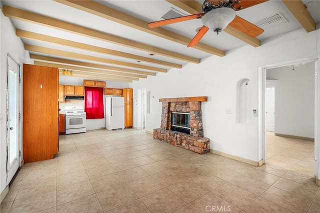 unfurnished living room with a fireplace, ceiling fan, beamed ceiling, and light tile patterned flooring