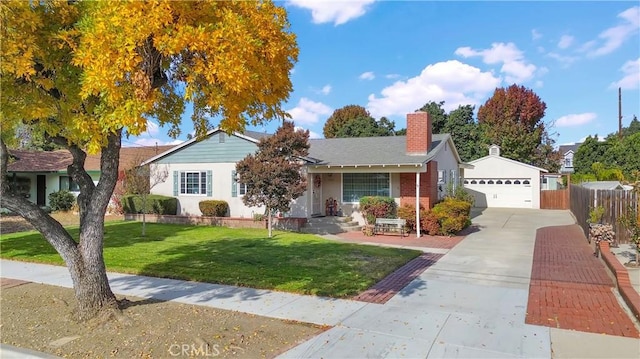 ranch-style home with a garage and a front yard