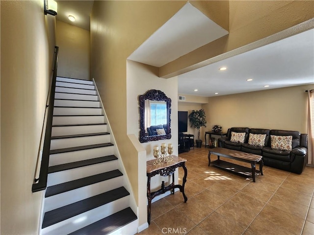 living room featuring tile patterned floors