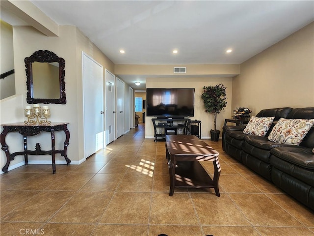 living room with light tile patterned floors