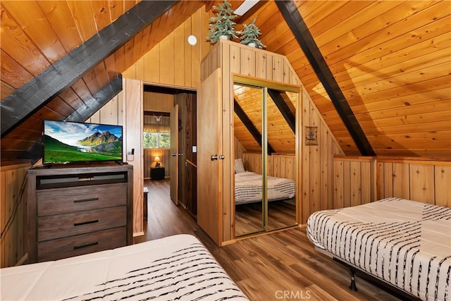 bedroom with dark hardwood / wood-style flooring, lofted ceiling with beams, wooden walls, and wooden ceiling