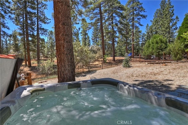 exterior space featuring a jacuzzi