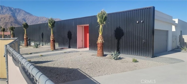 exterior space with a mountain view