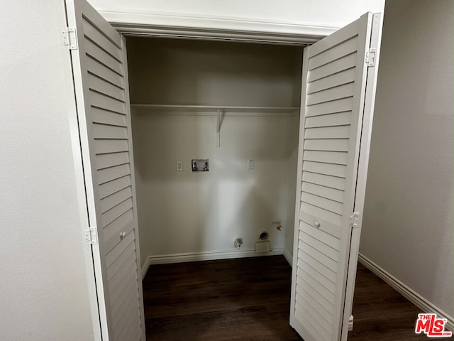 washroom with washer hookup and dark hardwood / wood-style flooring