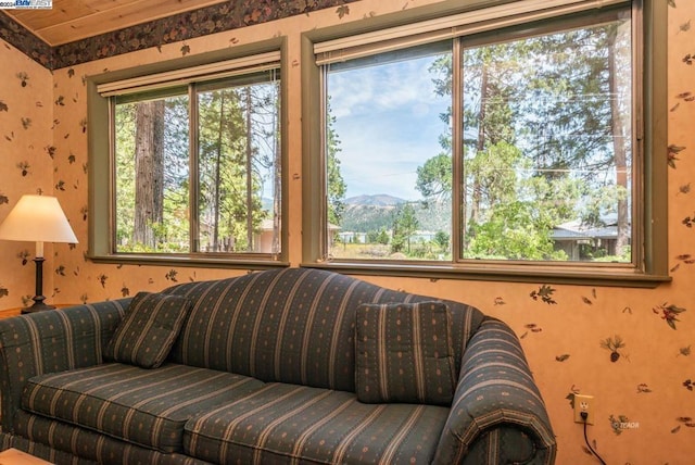 interior space with a mountain view and plenty of natural light