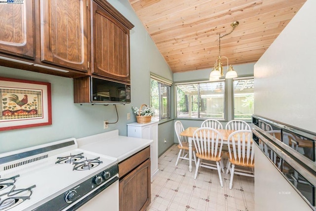 kitchen featuring white range, vaulted ceiling, hanging light fixtures, and wood ceiling