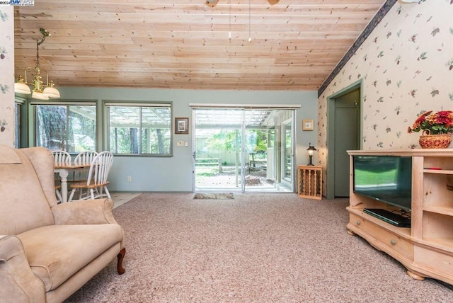 living room featuring carpet floors, wood ceiling, lofted ceiling, and a notable chandelier