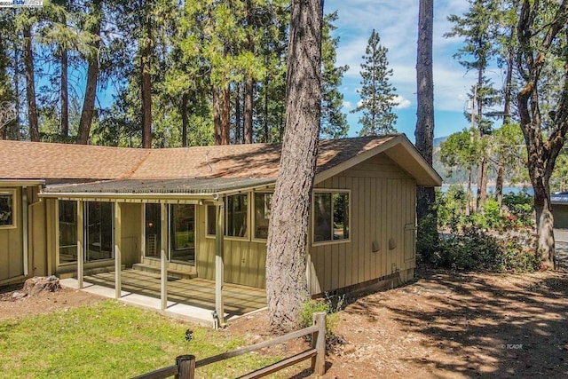 view of side of home featuring a patio