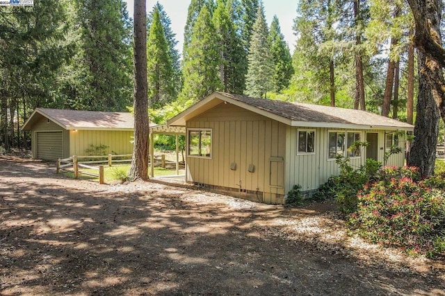 view of outdoor structure with a garage